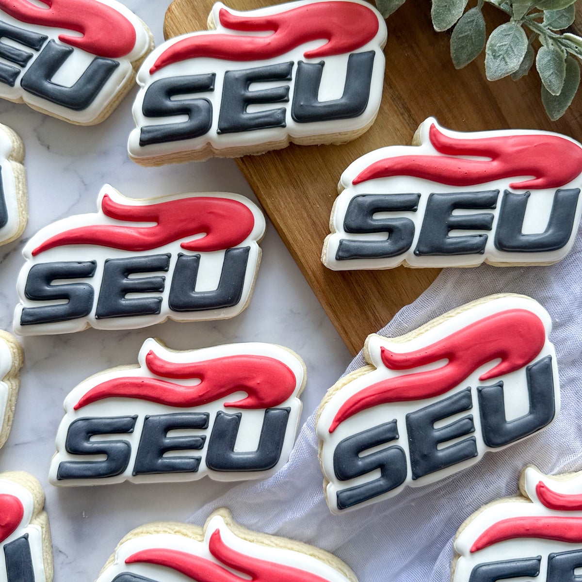 Custom Southeastern University logo cookies created for the university rebrand